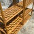Enhance your decor with the natural charm of this Vintage Coastal Parquet Rattan Etagere. Perfect for American-style...