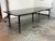 Design Plus Gallery presents a Mid Century Modern Styled Walnut Wood Dining Room Table. The table has a bow shaped with a...