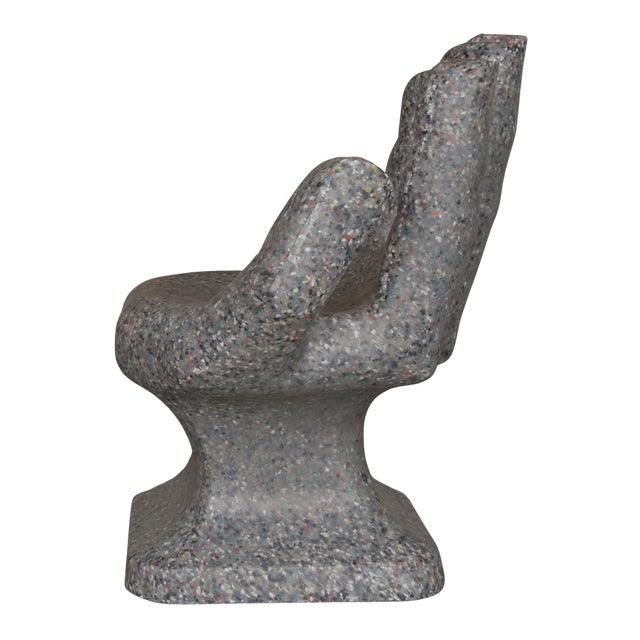 Playful and eye-catching hand-form chair in the style of the iconic RMIC design. Constructed from speckled recycled foam...