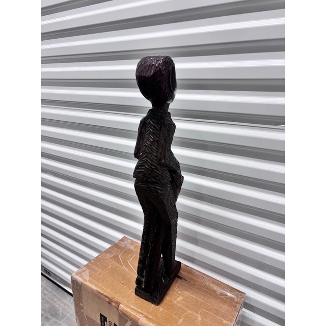 Vintage Hand-Carved Wooden African Tribal Figurine Depicting a Man Playing a Drum, Crafted From Dense Hardwoods Like Ebony For Sale In Miami - Image 6 of 12
