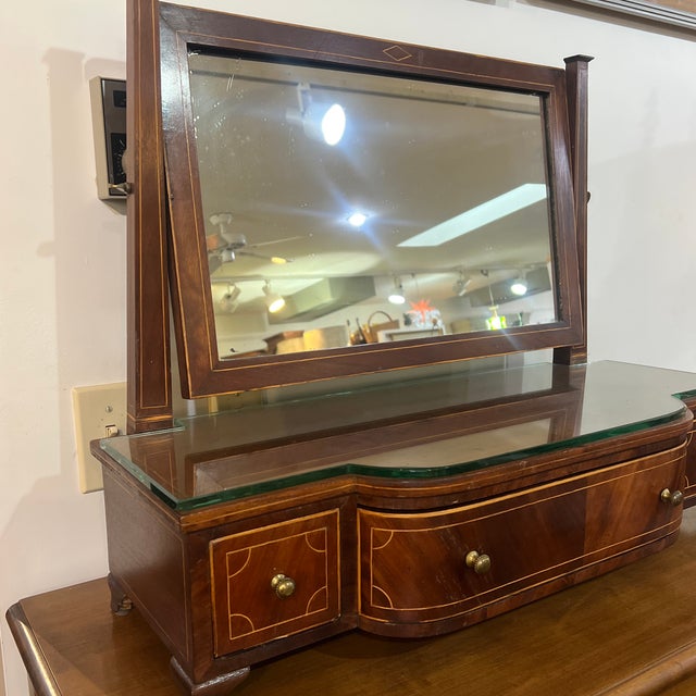 Mahogany Dressing Table with Swing Mirror Features beautiful inlay and a serpentine front pattern This remains in good...