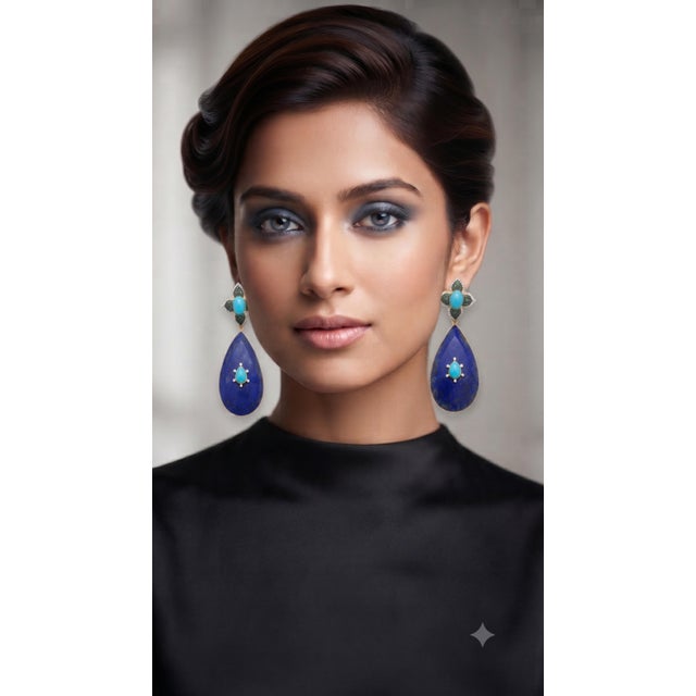 Gemstone details Diamond weight: 0.87 cts Tsavorite weight: 1.28 cts Lapis weight: 106.2 cts Turquoise weight: 4.54 cts...