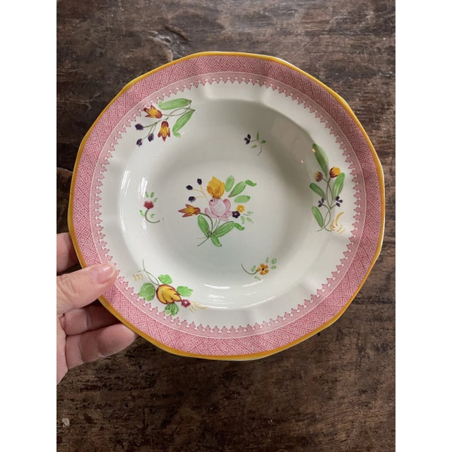 We love all things Calyx. lovely set of two bowls, hand painted with a tiny floral pattern and the center, in soft shades...