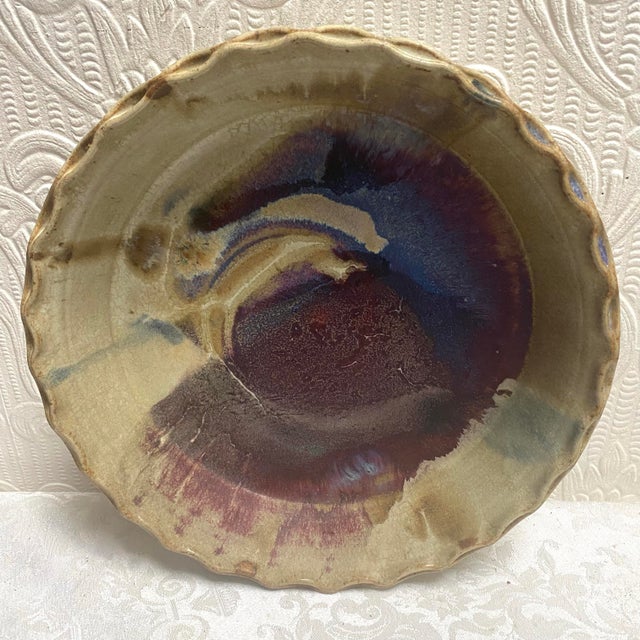 This is a beautiful handmade studio pottery, bowl or pie plate that is signed on the back. It appears to have never been...