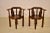Pair of 19th century carved oak corner chairs from England with a wonderfully carved back, supports and arms, all...