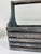 Vintage wooden tool caddy with a slatted body, solid wood sides, and a fixed carrying handle. The blue-gray painted finish...