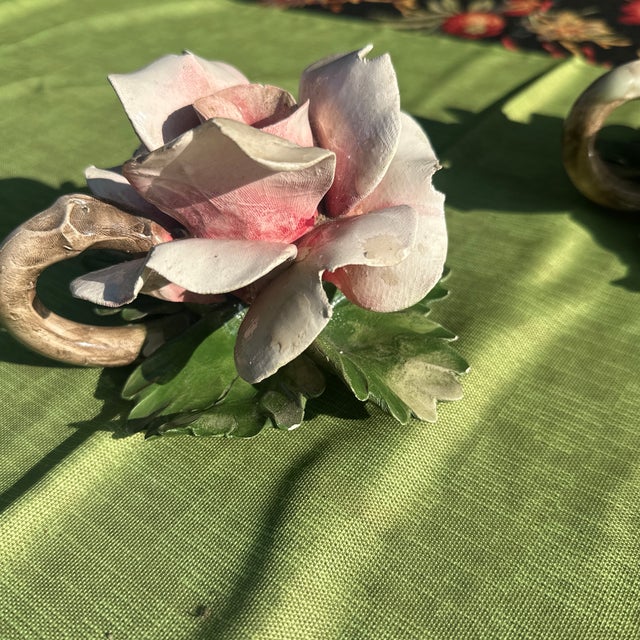 Up for consideration is a beautiful pair of ceramic floral candlestick holders. These would look lovely in your home and...