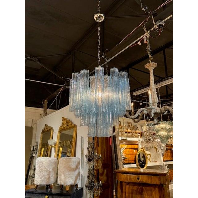 Glistening modern aqua blue "Trochi" style Murano chandelier. Featuring four layers of beautiful glass. Stunning! This...