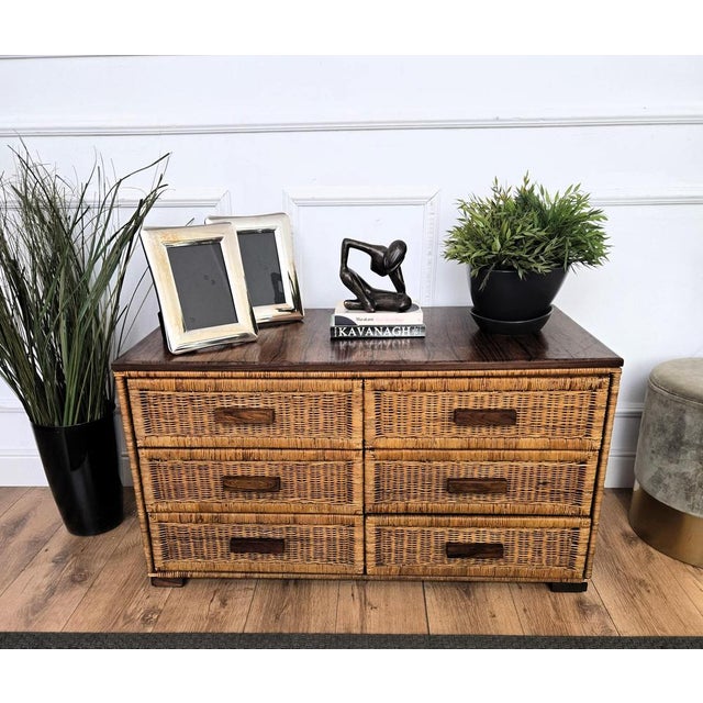 Beautiful 1960s Italian Mid-Century Modern chest of drawers, commode in bamboo and rattan with 3 drawers on each side. The...