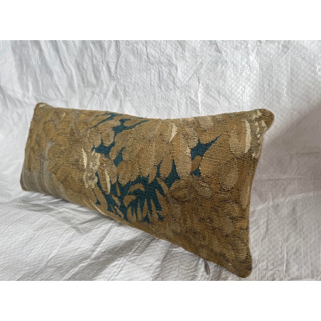 A rare and decorative 17th century Brussels tapestry pillow, created from a fragment of Flemish Baroque weaving. Unlike...