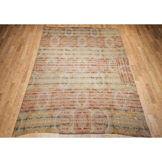 This rare 19th-century Continental European hand-loomed rug presents a bold and timeless aesthetic through its large-scale...