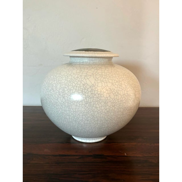 Handmade mid century era studio pottery. Made by Rob Wiedmaier. Adorned with his signature style of a complex abstract...