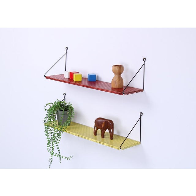 Characteristic and very decorative small shelving units from the Netherlands, in the manner of Pilastro / Mategot....