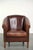 Sheepskin club armchair in a dark cognac color in the English style. : This sheepskin club armchair is made in the English...