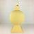 Large lamp from the Faïencerie de Charolles 1980 in ceramic with pale yellow matt enamel. Lamp holder adjustable in...