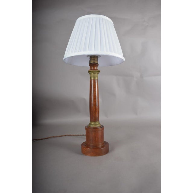 The turned architectural column, borrowed from classical building design, became a favorite silhouette for table lamps...