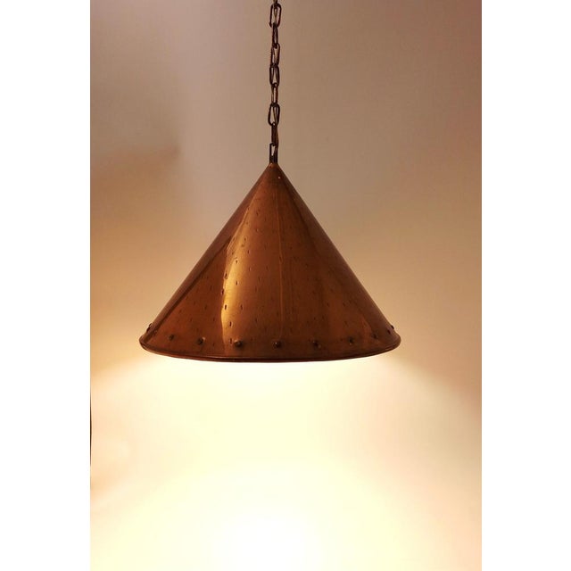 Elegant pendant lamp designed and manufactured by E.S. Horn Aalestrup in Denmark during the 1950s–1960s. The lamp features...