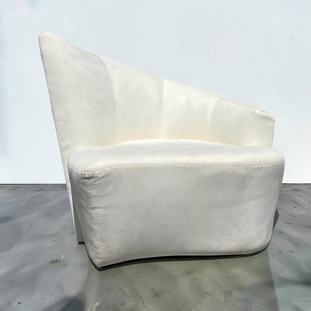 A sculptural modern swivel chair designed by Vladimir Kagan, and inspired by the curves and undulations of the Guggenheim...