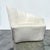 A sculptural modern swivel chair designed by Vladimir Kagan, and inspired by the curves and undulations of the Guggenheim...