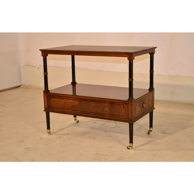 A Beacon Hill collection inlaid mahogany tiered side table with double sided single drawer. Beacon Hill furniture was...