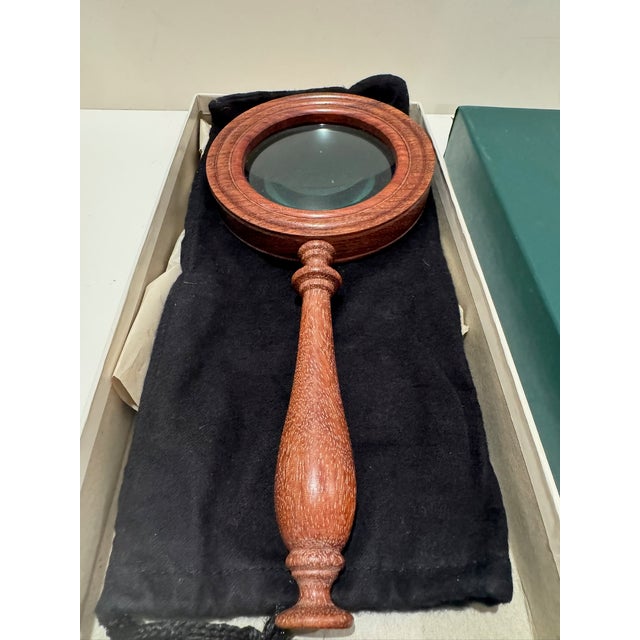 Solid hardwood construction with classic turned handle. Thick glass lens provides clear magnification without distortion...