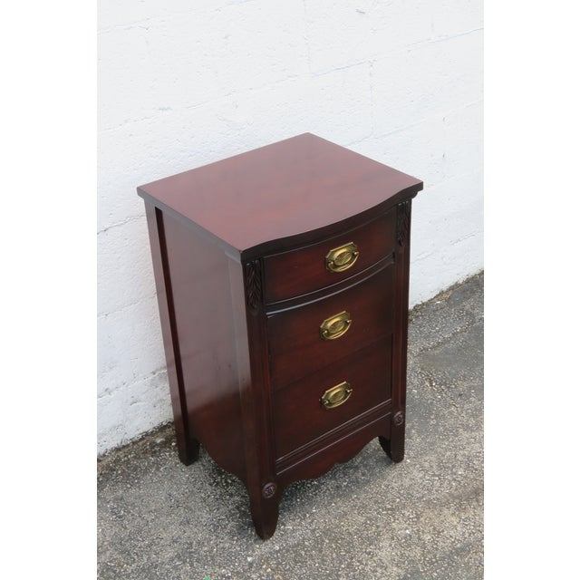 This delightful Mahogany Nightstand Side End Table is made of wood, solid wood, mahogany, veneer, and metal. This...