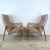 Add a touch of classic mid-century charm to your home with this pair of vintage Thonet-style lounge chairs. Featuring...
