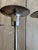 A rare and monumental pair of silvered brass 7-light wall candle sconces, masterfully executed in a sculptural "bundle of...