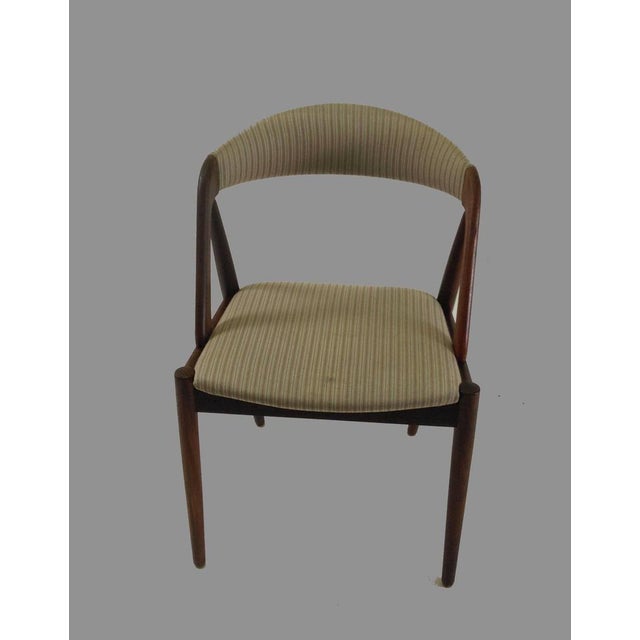 Model 31 is one of the most well-known chairs designed by Kai Kristiansen - a true Classic with its curved backrest,...