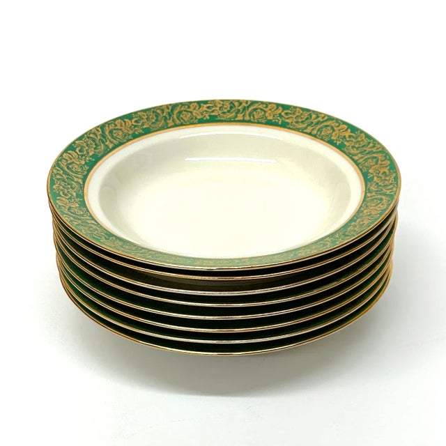 Green and gold bowls, group of 8. Vintage porcelain soup bowls with a Kelly-green rim and 22K gold embossed floral...