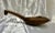 You can still see the grain of the wood in this late 19th century wooden spoon or paddle from France. It has stirred many...
