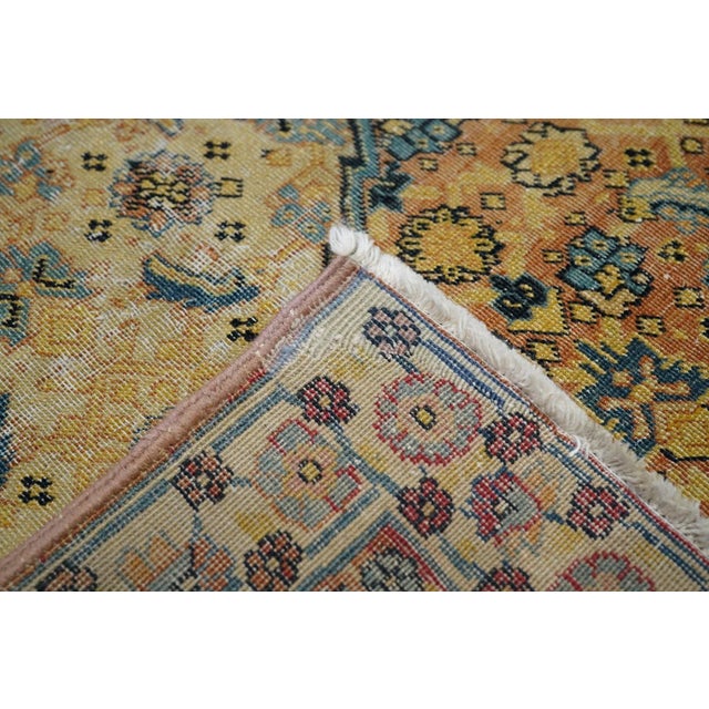 Tabriz loves to employ layers and layers of the small – scale allover Herati design, and here it comes in lozenge and...