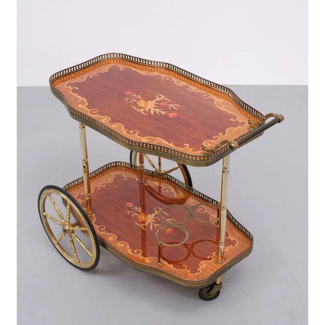Makes you smile, this Italian bar card or trolley 3 wheels. Inlay wooden trays. Comes with brass wheels and details. Made...