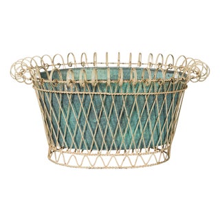 Rustic French Midcentury Oval Metal Cachepot with Scrolling Effects For Sale