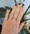A natural Brazilian alexandrite glows at the centre of this solid 14K rose gold ring, accented by seven earth-mined...