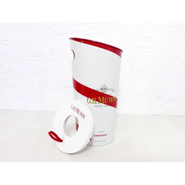 Champagne bucket mumm red cord Keep your "champagne" in the cool with this pretty collector's ice bucket from the famous...