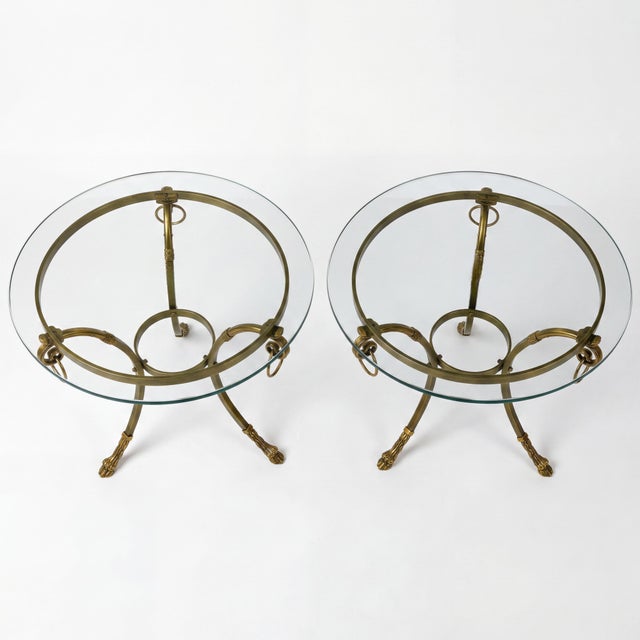This is a set of Italian neoclassical style drinks tables with Maison Jansen styling. Each table has the Jansen signature...