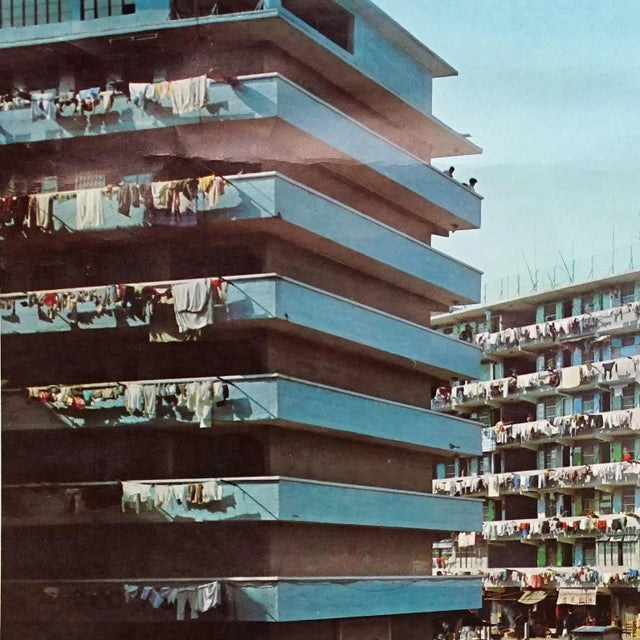 The vintage pull-down wallchart shows life in housing silos in Hong Kong in the 1970s. A great photo mural from Westermann...