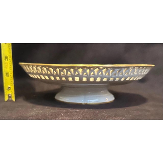 This vintage early 20th century Continental glazed white porcelain KPM compote is beautifully designed with a wonderful...