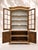 An elegant two-part cabinet in solid oak, dating from the 18th century and originating from Northern France, boasts...