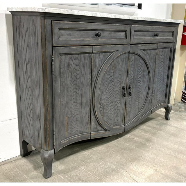 Original retail $3825, stylish Hooker Furniture Gray Distressed Wood Melange Credenza, Carrara marble top, two drawers,...