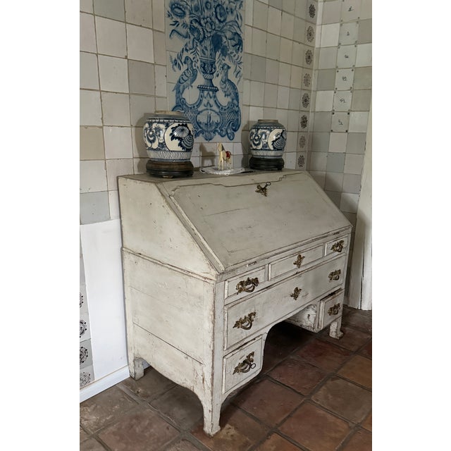 This piece of furniture from around 1800 is a special piece. It's an original folding secretary with numerous drawers and...