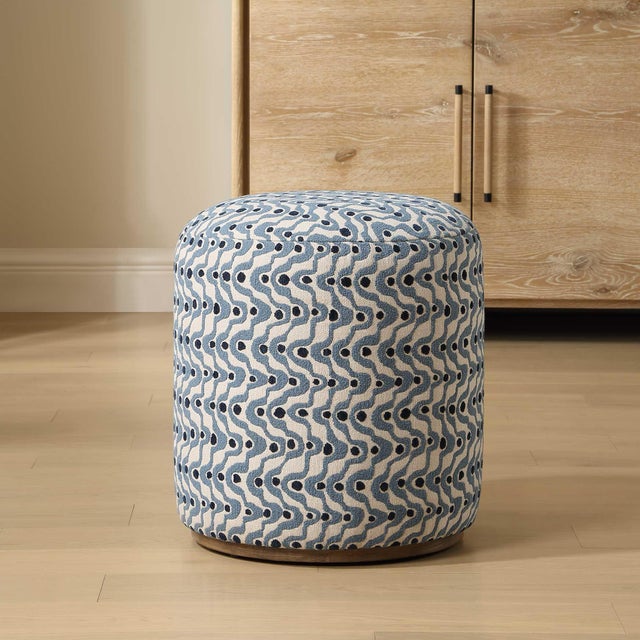 Wrapped In A Plush Fabric, This Ottoman Features A Captivating Pattern Of Organic Steel Blue Swirls And Dots Of Navy....