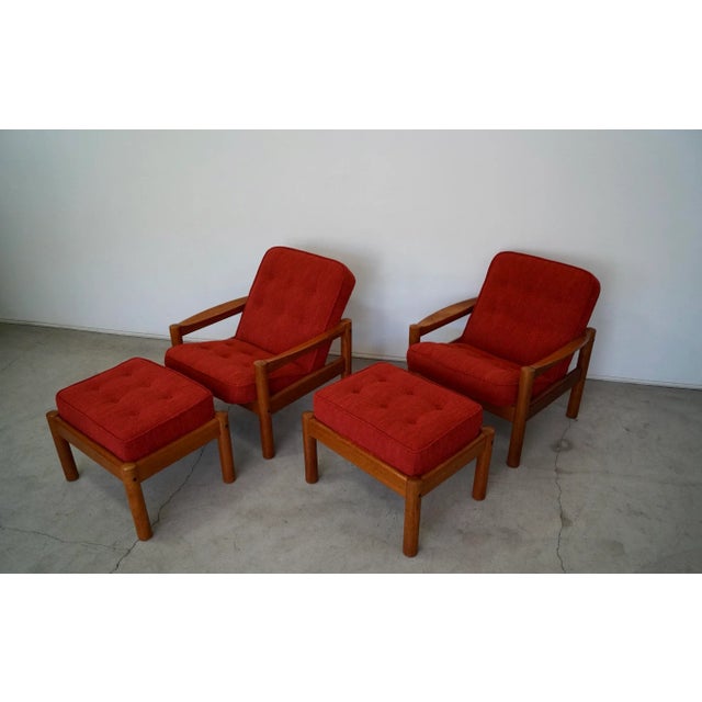 Pair of vintage Midcentury Modern lounge chairs for sale. They were manufactured in the 1970's, and have been...