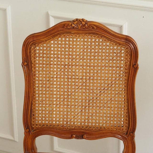 An elegant French chair in the Louis XV style, circa 1920s, with a seat and backrest made of Viennese cane webbing. The...