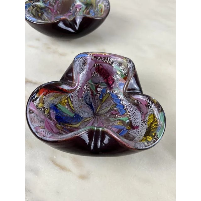 Pair of variegated Murano glass ashtrays, 70s Wedding gift of my grandparents, they are in excellent condition.