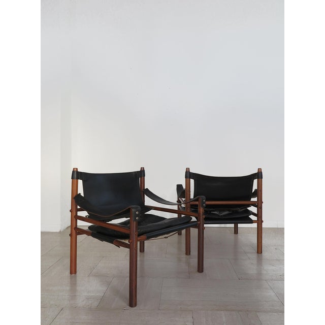 Couple of Scandinavian midcentury modern design armchairs Sirocco model designed by Arne Norell and manufactured by Arne...