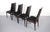 About the Rosewood Danish Modern Dining Chairs - A Set of 4 This set of 4 Danish Modern Dining Chairs in brilliant...