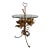 This gilt metal, glass top side table features a sculptural base of 3 arching tulips as they open to reveal an internal...