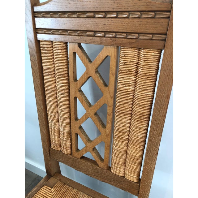 This set of 6 unusual Brutalist chairs is made of ash wood and straw. This is French work, circa 1950.